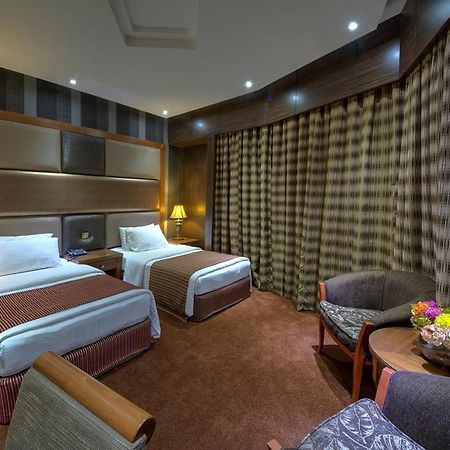 Delmon Palace Hotel Dubai Værelse billede